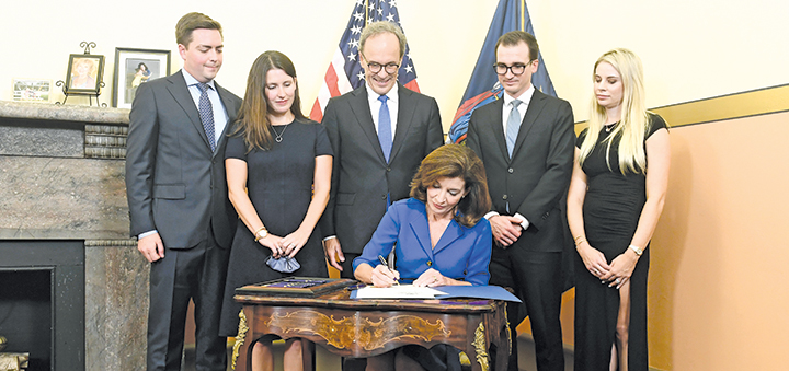 Hochul, NY's 1st female governor, inherits vast challenges